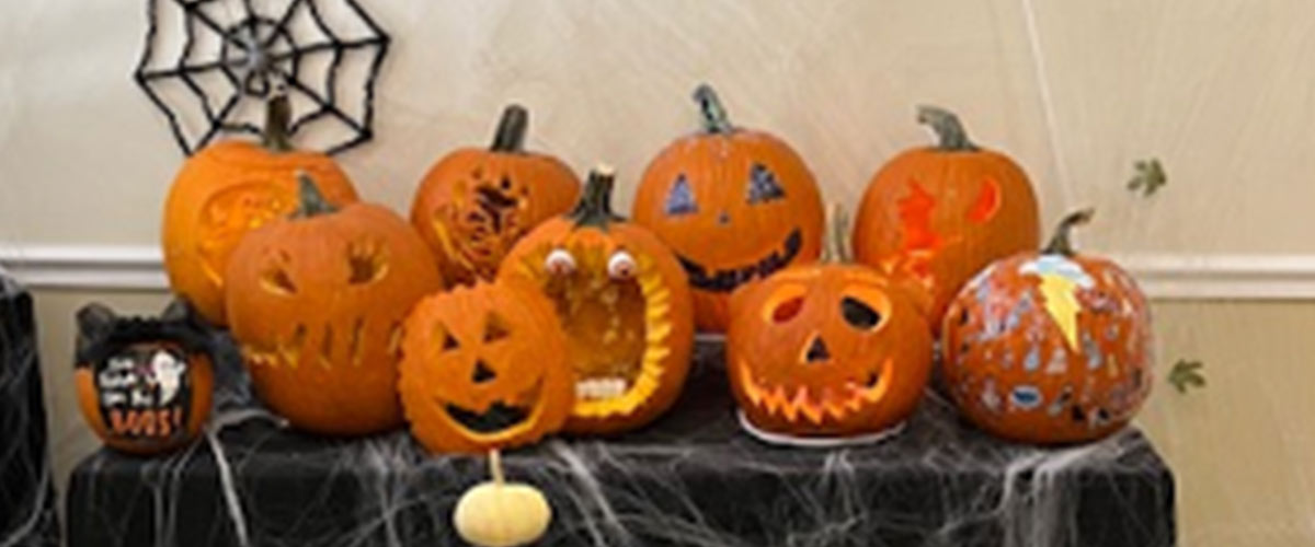 Assorted carve pumpkins from Cottrell Title & Escrow's pumpkin carving contest