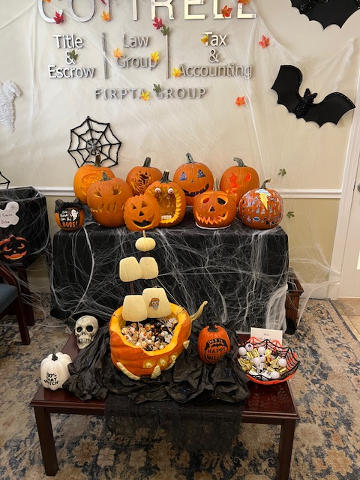 Assorted carve pumpkins from Cottrell Title & Escrow's pumpkin carving contest